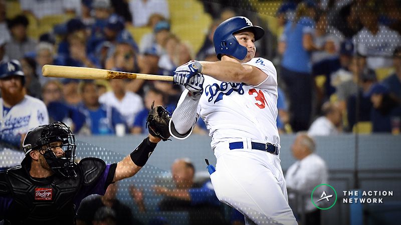 Los Angeles Dodgers left fielder Joc Pederson (31) hits a two run home run against the Colorado Rockies during the fourth inning at Dodger Stadium.