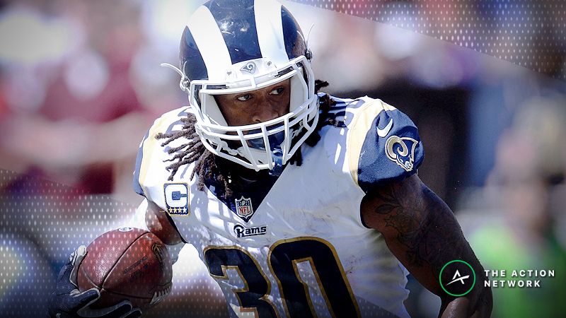 Los Angeles Rams running back Todd Gurley (30) runs the ball against the Arizona Cardinals during the first half at the Los Angeles Memorial Coliseum.