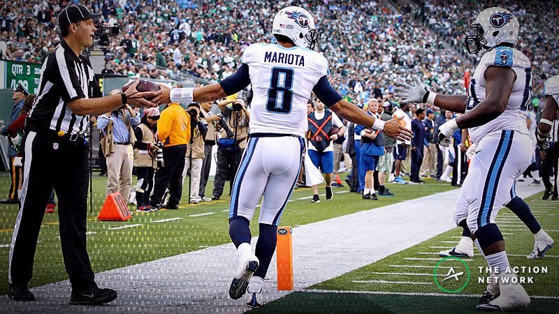 Tennessee Titans quarterback Marcus Mariota (8) celebrates after a touchdown reception against the Tennessee Titans at MetLife Stadium.