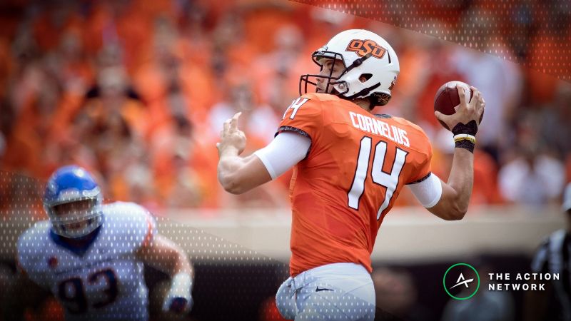 Oklahoma State Cowboys quarterback Taylor Cornelius (14) looks to pass against the Boise State Broncos during the first quarter at Boone Pickens Stadium.